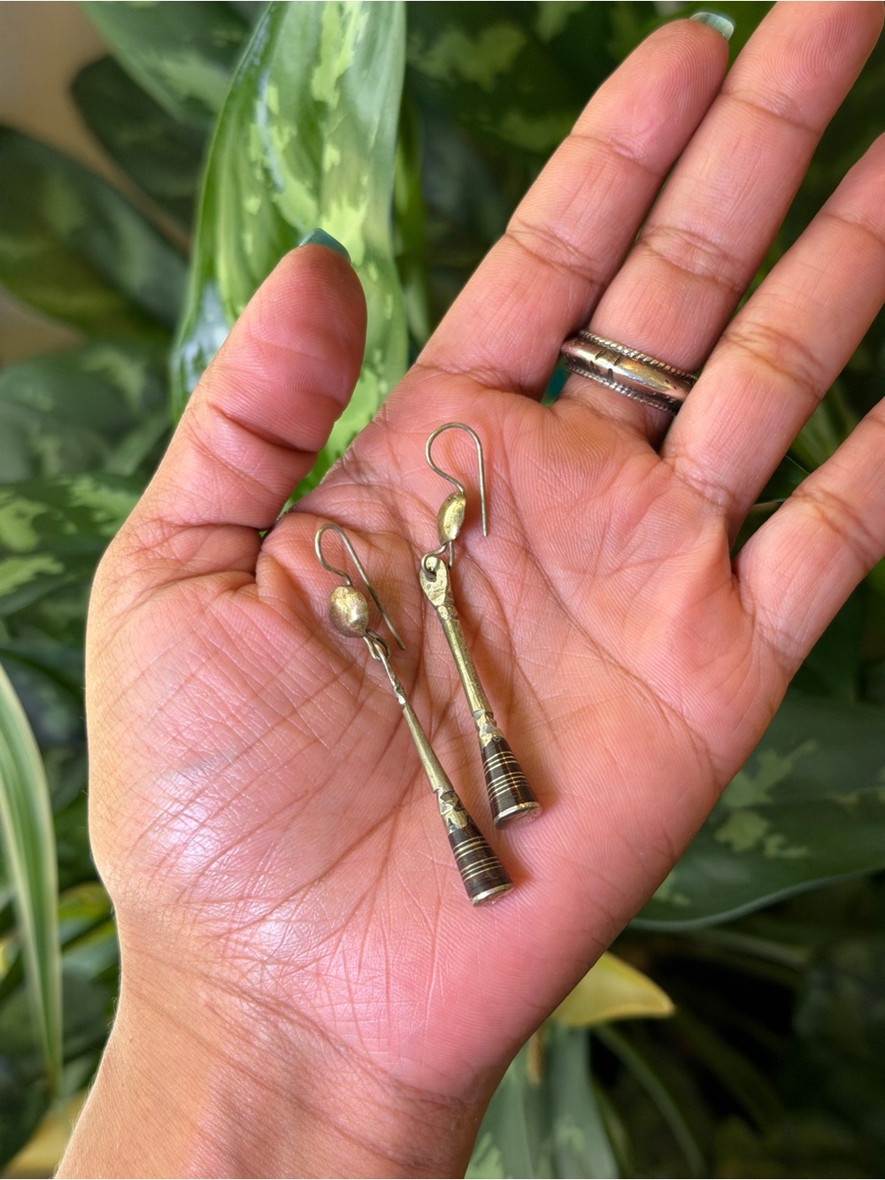 vintage handmade Tuareg drop earrings featuring the classic "candle" silhouette.